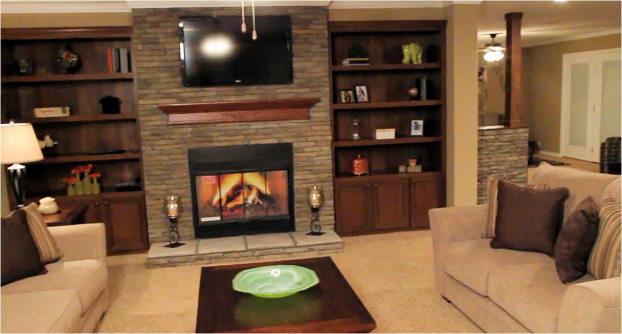 1-fireplace-bookshelves-living-room-champion-3019-manufactured-home-living-news-mhlivingnews-com-