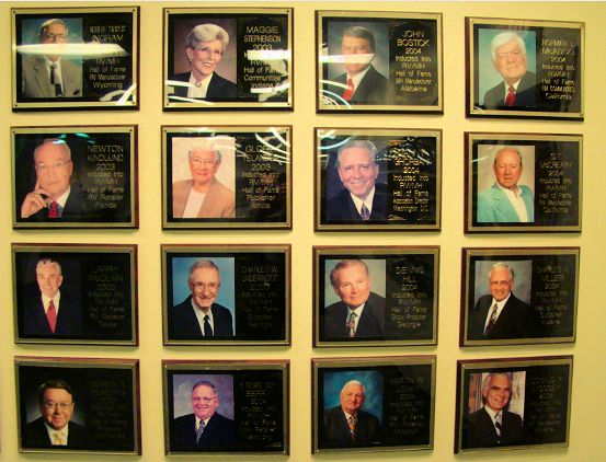 plaques-inductees-rv-mh-hall-fame-elkhart-in-manufactured-home-living-dennis-hill-3rd-from-left-3rd-from-top-john-bostic-top-3rd-left-.jpg