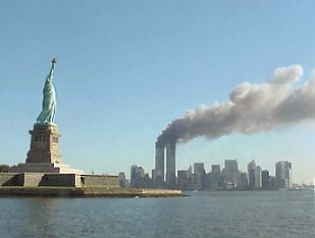 9-11_statue_of_liberty_and_wtc_fire-wikicommons-posted-mhlivingnews-com-