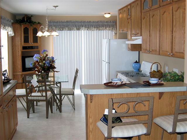 2-liberty-aurora-corne-dining-entertainment-posted-manufactured-home-living-news-