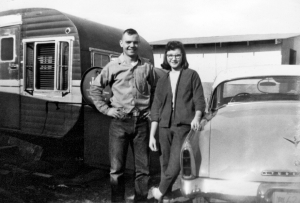 Bob Vasholtz and wife, by 1952 Rebel Trailer House,