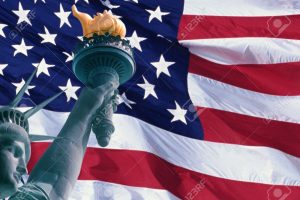 AmericanFlagStatueLiberty-head-arm-and-torch-credit123RF-postedMHLivingNews